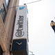 The Twitter logo is seen outside its San Francisco headquarters.